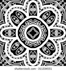 Circular   pattern of floral motif, ellipses, stars, spirals,stylized flower. Hand drawn.