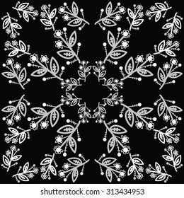 Circular   pattern of floral motif, ellipses, branches,leaves, doodles . Hand drawn.