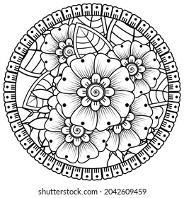 Circular pattern in the form of mandala with flower for henna, mehndi, tattoo, decoration. 