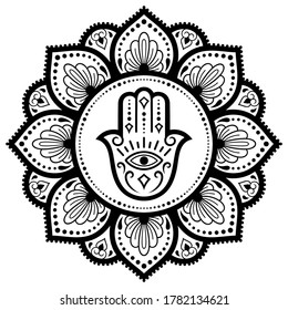 Circular pattern in form of mandala for Henna, Mehndi, tattoo, decoration. Decorative ornament in oriental style with Hamsa hand drawn symbol. Coloring book page.