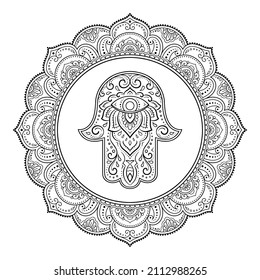 Circular pattern in form of mandala for Henna, Mehndi, tattoo, decoration. Decorative ornament in oriental style with Hamsa hand drawn symbol. Coloring book page.