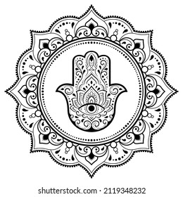 Circular pattern in form of mandala for Henna, Mehndi, tattoo, decoration. Decorative ornament in oriental style with Hamsa hand drawn symbol. Coloring book page.