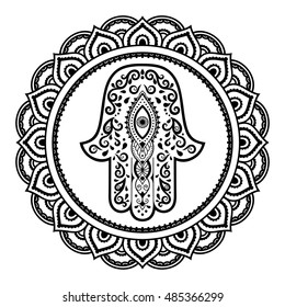 Circular pattern in form of mandala for Henna, Mehndi, tattoo, decoration. Decorative ornament in oriental style with Hamsa hand drawn symbol. Coloring book page.