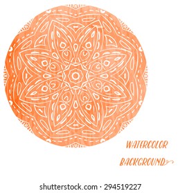 A circular pattern on a watercolor orange