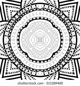 Circular   pattern of  striped motif,  doodles,   ellipses, zigzag, spirals, stars. Hand drawn.