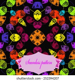 Circular seamless pattern of colored floral motif, autumn leaves, label on a black  background. Hand drawn.