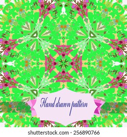 Circular seamless pattern of colored floral motifs, label on a white   background. Hand drawn.