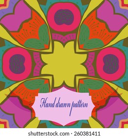 Circular seamless pattern of colored floral motif, label.Hand drawn.