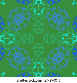 Circular  seamless pattern of colored motif,  snowflakes, stars. Hand drawn.