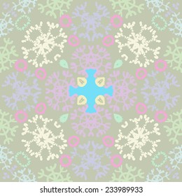 Circular seamless pattern of colored snowflakes on a pale green background. Handmade.