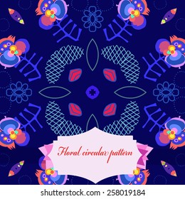 Circular seamless pattern of floral motif, label on a dark blue   background. Handmade.