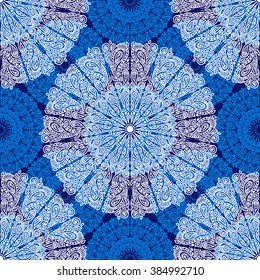 Circular seamless pattern. Ornamental texture, mandala. Blue and white graphics, painted by hand. For the design and decoration background, wallpaper, packaging, fabrics, textiles.