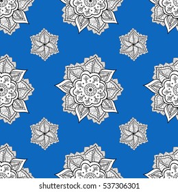 Circular seamless pattern. Ornamental texture mandala. Blue and white graphics, painted by hand.