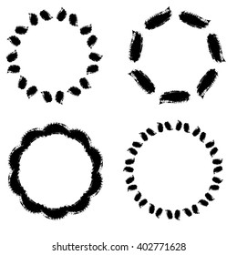 Circular shapes, ink strokes, four pieces isolated on white