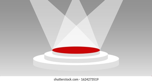 The circular stage with the red carpet has lighting on a gray abstract background.