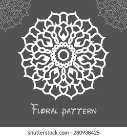 Circular symmetric white pattern on dark background