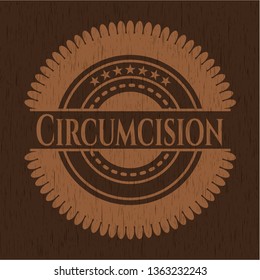 Circumcision badge with wood background