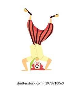 Circus acrobat or clown cartoon character standing on his head, flat vector illustration isolated on white background. Circus show performer or artist.