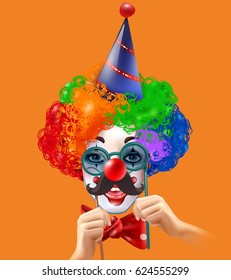 Circus clown smiling face with hands multi color wig and red bow on orange background vector illustration