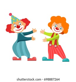 Circus clowns in classic outfit with red noses