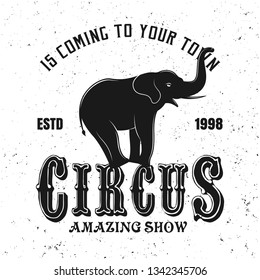 Circus show vector black emblem, label, badge or logo in vintage style with trained elephant silhouette isolated on white background