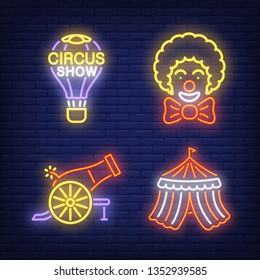 Circus tent, cannon, clown and hot air balloon neon signs set. Circus show and entertainment design. Night bright neon sign, colorful billboard, light banner. Vector illustration in neon style.