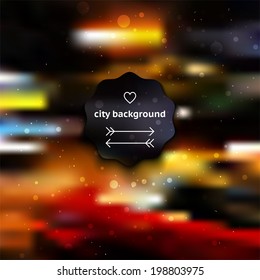 City blur background with lights, dots, and label