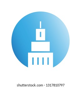 city building in blue circle shape icon