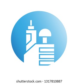city building in blue circle shape icon