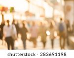 City commuters. High key blurred image of workers going back home after work. Unrecognizable faces, bleached effect.