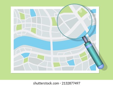 Vista superior del mapa de la ciudad con cristal de ampliación