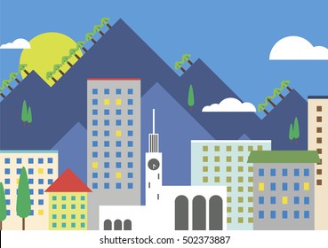 city on a background of mountains and sunset