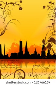 city on flowers background with place for text
