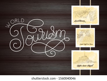 City sketching. Line art silhouette. Travel cards on wood background. World tourism lettering. Luxembourg. France, Saint-Paul-de-Vence, Mont Saint-Michel. Sketch style vector illustration.