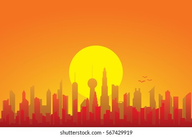 City skyline and sun.