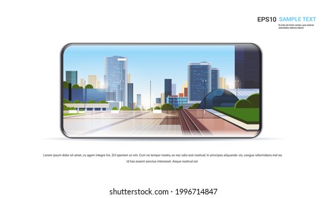 city skyscraper view on smartphone screen cityscape background realistic gadgets and devices concept