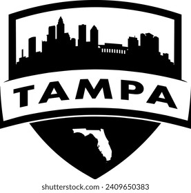 City of Tampa Florida black and white shield style city buildings silhouette shield graphic with knockout white outline of the state border shape under name. Vector eps design. 