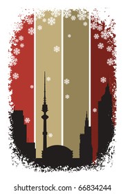 The city's skyline on the background of snowflakes