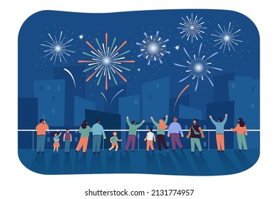 Cityscape with crowd of happy people looking at fireworks in sky. Cartoon adults and kids at celebratory or festive spectacle at night flat vector illustration. Celebration, pyrotechnics concept