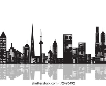 cityscape at night and its reflection on river