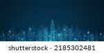 Cityscape on dark blue background with bright glowing neon. Technology city background