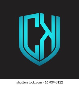 CK Logo monogram with emblem shield design isolated with blue colors on black background