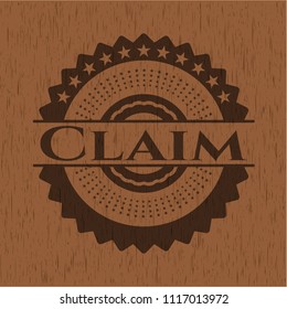Claim badge with wood background