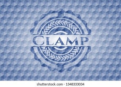Clamp blue emblem with geometric pattern.