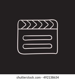 Clapboard vector sketch icon isolated on background. Hand drawn Clapboard icon. Clapboard sketch icon for infographic, website or app.