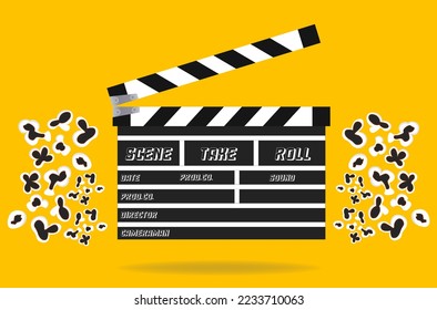 Clapperboard and popcorn on the sides on a yellow background