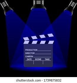 Clapperboard used in filmmaking with text and three spotlights