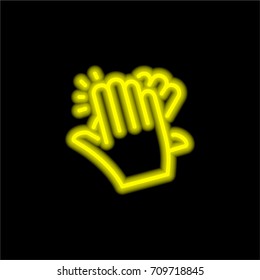 Clapping yellow glowing neon ui ux icon. Glowing sign logo vector