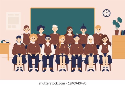 Class group portrait. Smiling girls and boys dressed in school uniform or pupils sitting in classroom against chalkboard on background and posing for photography. Flat cartoon vector illustration.