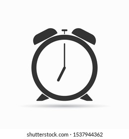Classic alarm clock over white background